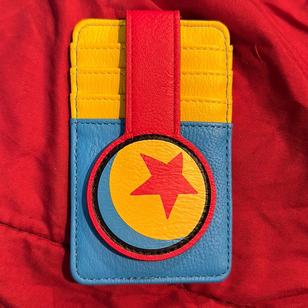 EUC Disney Pixar Ball Card Holder